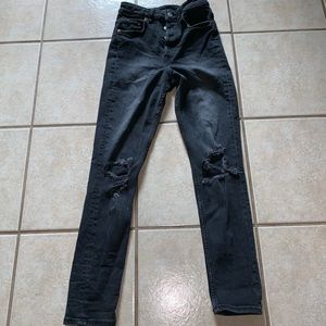 Black ripped high waisted jeans.